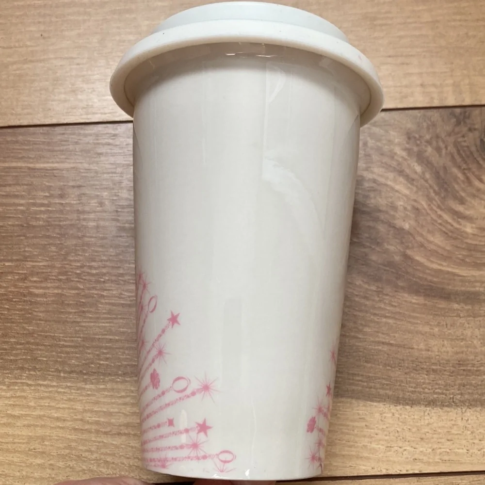Lancôme ceramic 12 ounce tumbler.
